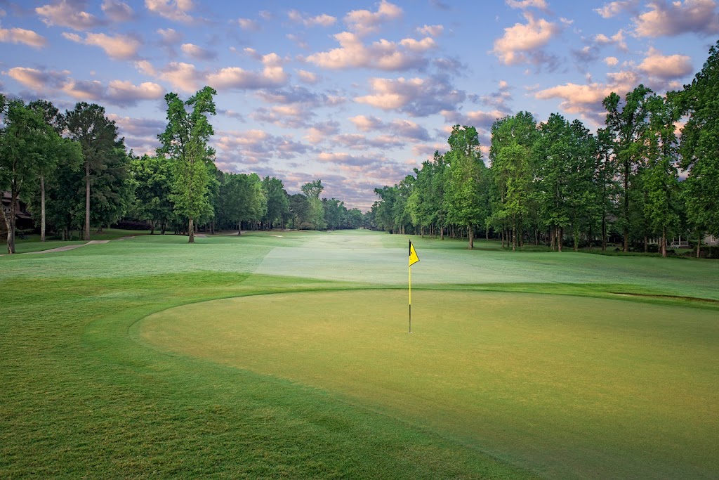 Panoramic view of a lush green golf course at Greystone Golf & Country Club. Smooth