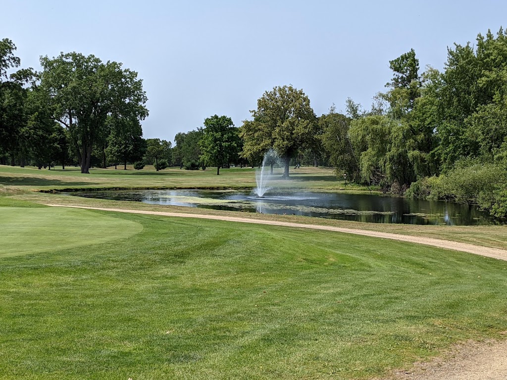 Panoramic view of a lush green golf course at Gross National Golf Club. Smooth