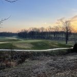 Panoramic view of a lush green golf course at Hail Ridge Golf Club. Smooth