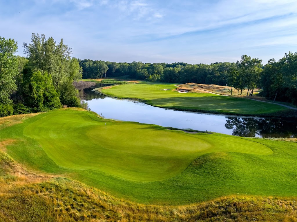 Panoramic view of a lush green golf course at Harbor Shores Golf Club. Smooth