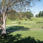 Panoramic view of a lush green golf course at Harmony Landing Campus