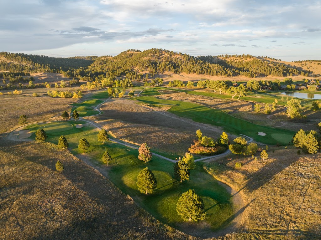 Panoramic view of a lush green golf course at Hart Ranch Golf Club. Smooth