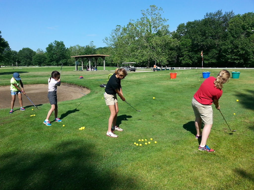 Panoramic view of a lush green golf course at Heart of America Golf Course. Smooth