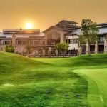 Panoramic view of a lush green golf course at Heritage Eagle Bend Golf Club. Smooth