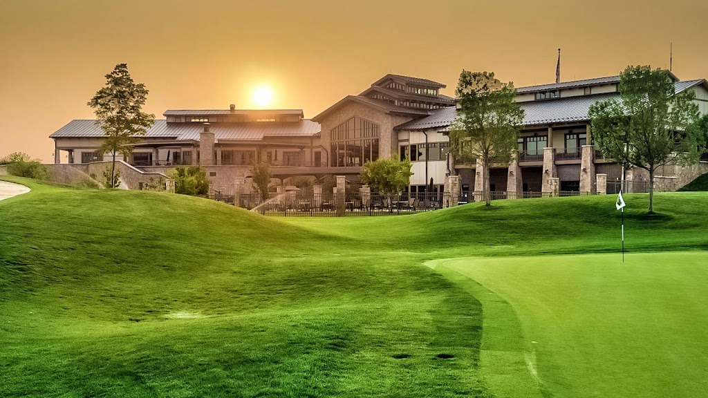 Panoramic view of a lush green golf course at Heritage Eagle Bend Golf Club. Smooth