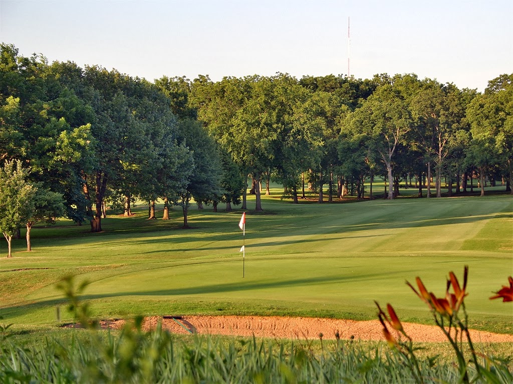 Panoramic view of a lush green golf course at Heritage Hills Golf Course. Smooth