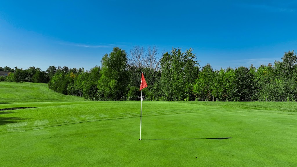 Panoramic view of a lush green golf course at Heritage of Hawk Ridge Golf. Smooth