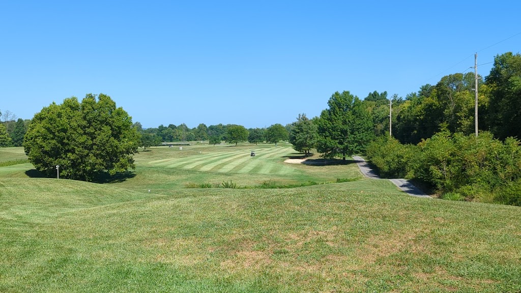 Panoramic view of a lush green golf course at Hidden Creek Golf Club. Smooth