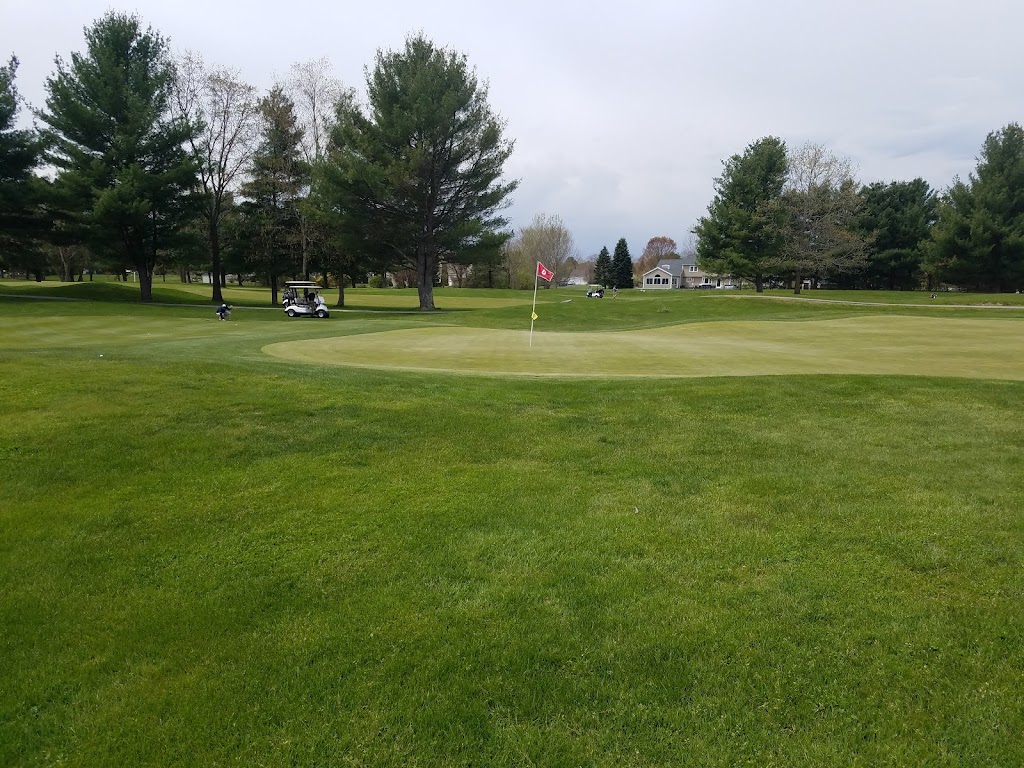 Panoramic view of a lush green golf course at Hidden Creek Golf Course. Smooth