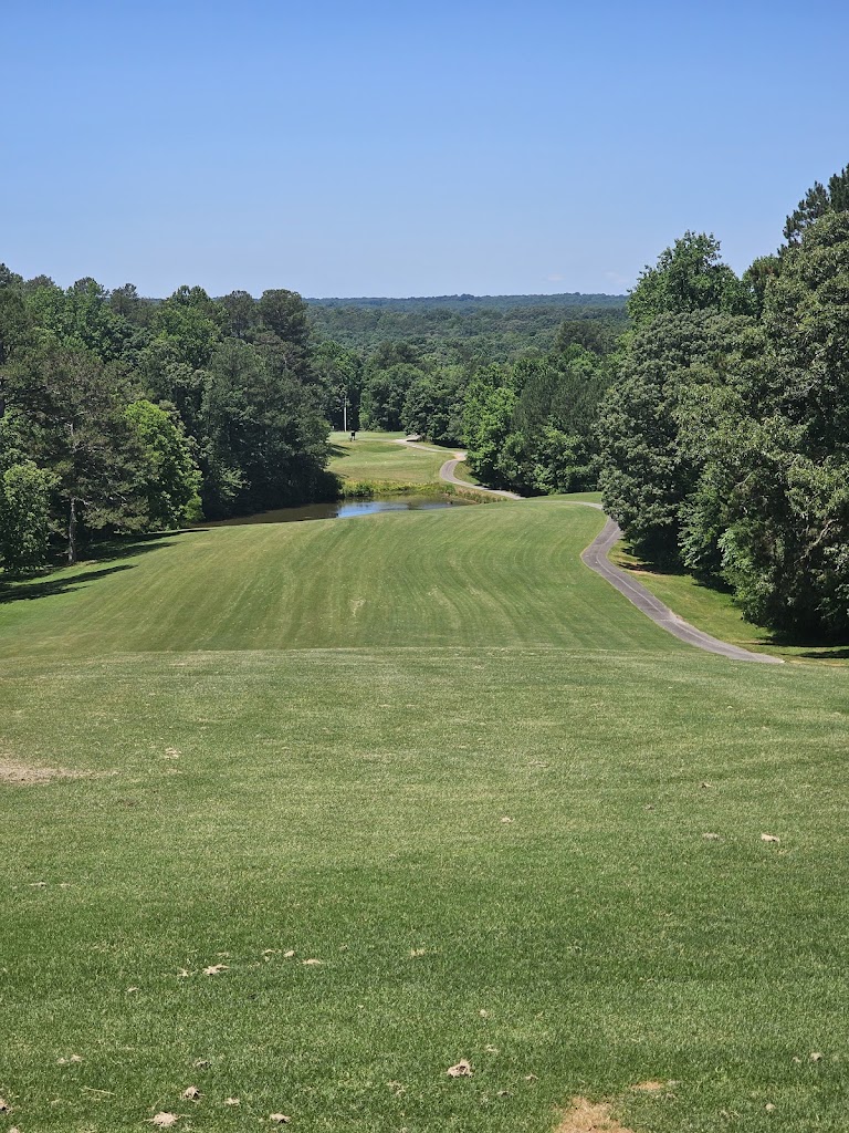 Panoramic view of a lush green golf course at Highland Walk Golf Course at Victoria Bryant. Smooth