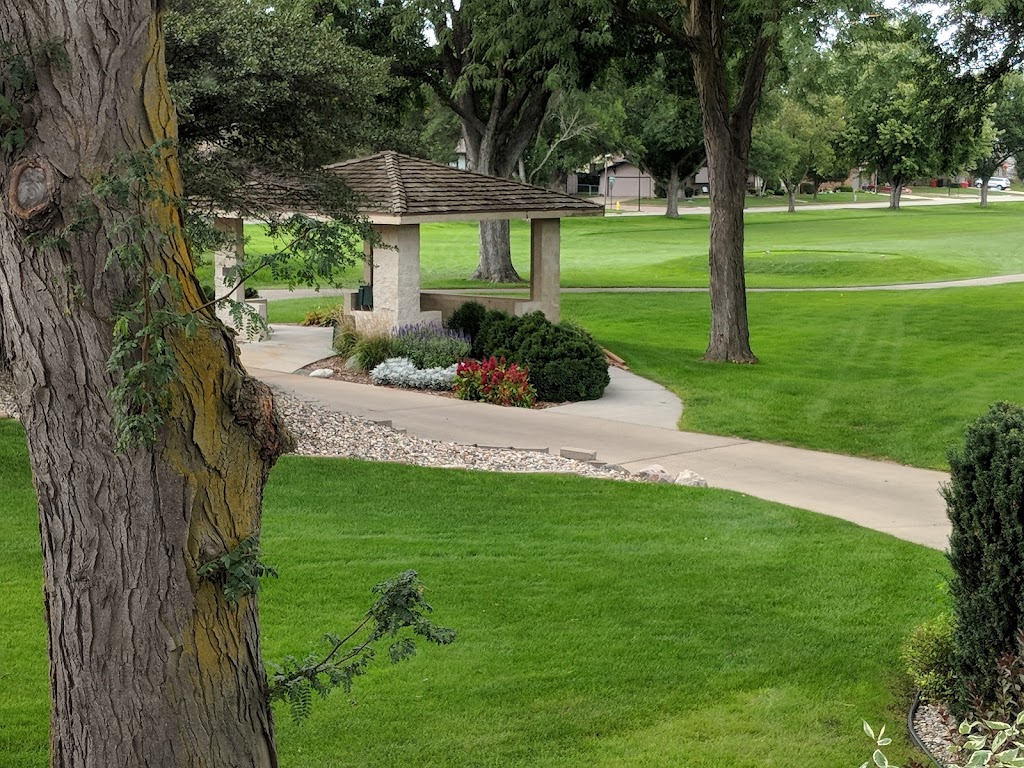 Panoramic view of a lush green golf course at Hillcrest Golf & Country Club. Smooth