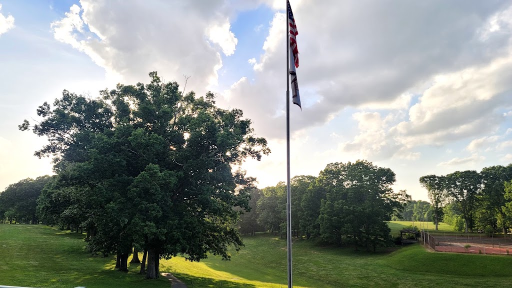 Panoramic view of a lush green golf course at Historic Black Knight Municipal Park. Smooth