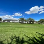 Panoramic view of a lush green golf course at Hoakalei Country Club. Smooth