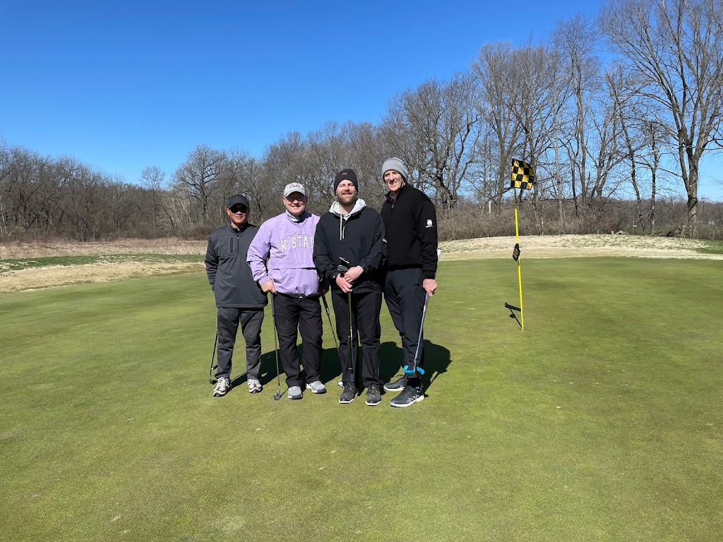 Panoramic view of a lush green golf course at Hodge Park Golf Course. Smooth