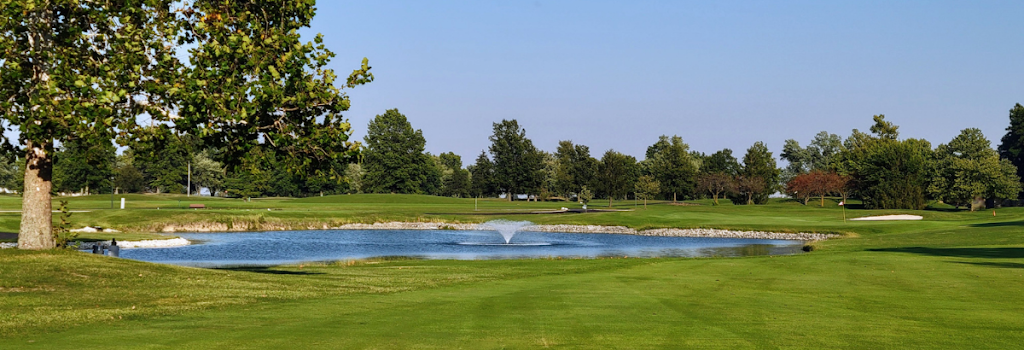 Panoramic view of a lush green golf course at Honeywell Golf Course. Smooth