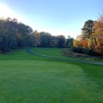 Panoramic view of a lush green golf course at Howell Park Golf Course. Smooth