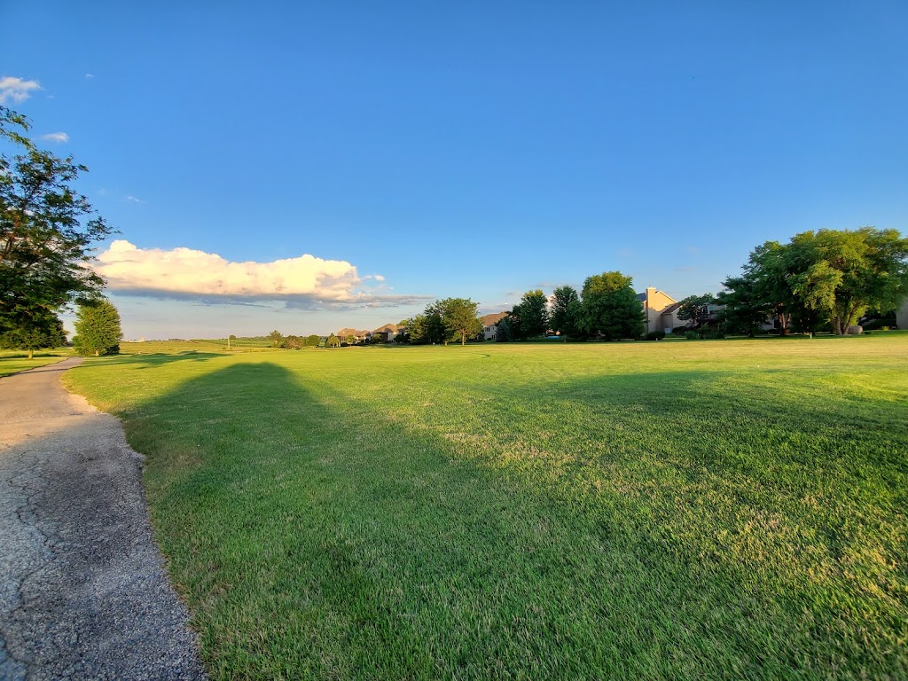 Panoramic view of a lush green golf course at Hunters Ridge Golf Course. Smooth