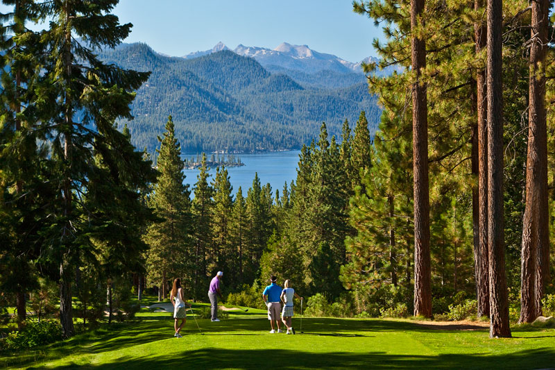 Panoramic view of a lush green golf course at Incline Village Championship Golf Course. Smooth