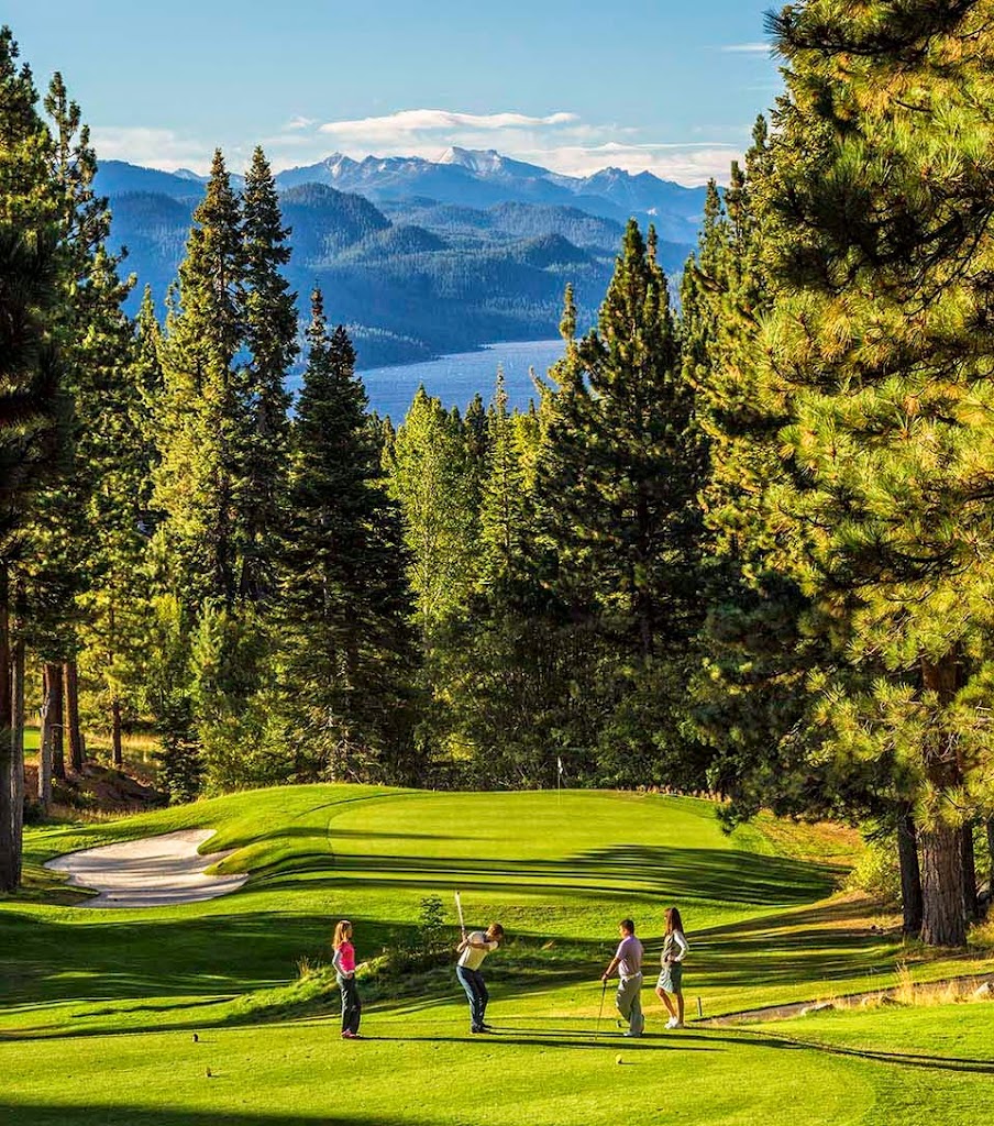 Panoramic view of a lush green golf course at Incline Village Mountain Golf Course. Smooth