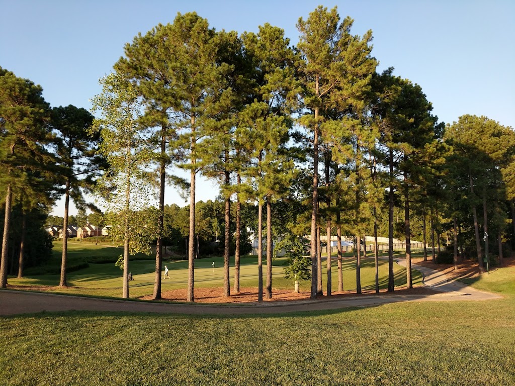 Panoramic view of a lush green golf course at Independence Golf Club. Smooth