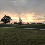 Panoramic view of a lush green golf course at Indian Tree Golf Club. Smooth