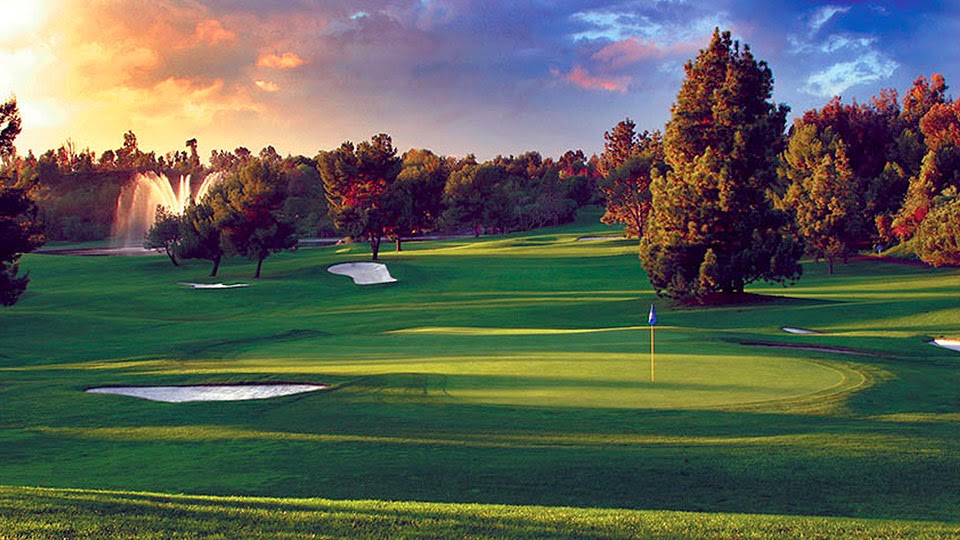 Panoramic view of a lush green golf course at Industry Hills Golf Club at Pacific Palms Resort. Smooth