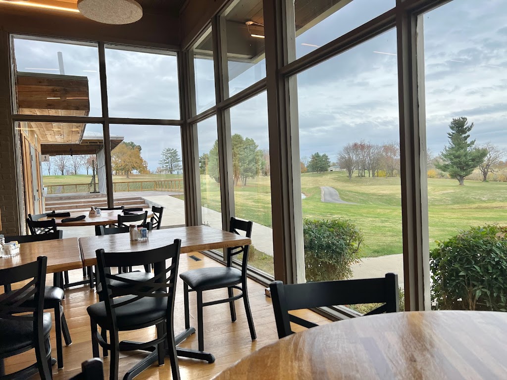 Panoramic view of a lush green golf course at Irish Hills Restaurant & Golf Club. Smooth