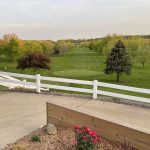 Panoramic view of a lush green golf course at Jefferson Community Golf Course. Smooth