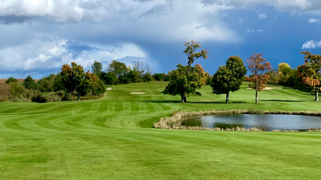 Panoramic view of a lush green golf course at Jefferson Golf Course. Smooth