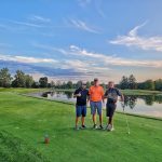 Panoramic view of a lush green golf course at Kampen-Cosler Course. Smooth