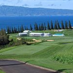 Panoramic view of a lush green golf course at Kapalua Golf - The Plantation Course. Smooth