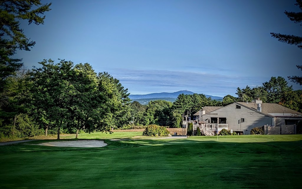 Panoramic view of a lush green golf course at Keene Country Club. Smooth