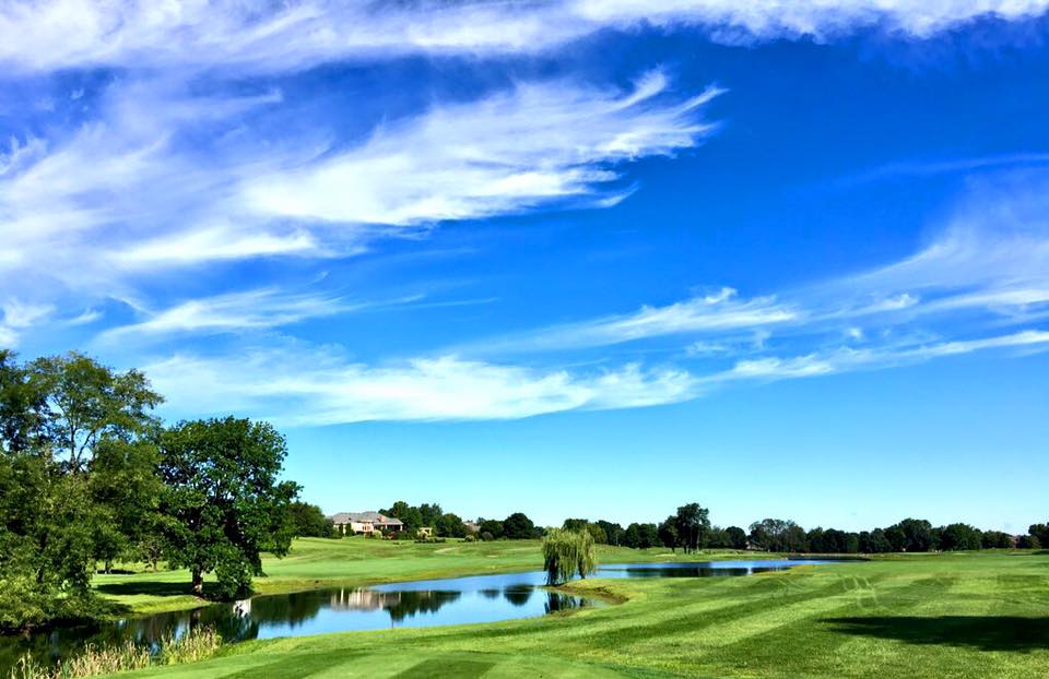 Panoramic view of a lush green golf course at Keene Trace Golf Club - Keene Run Course. Smooth