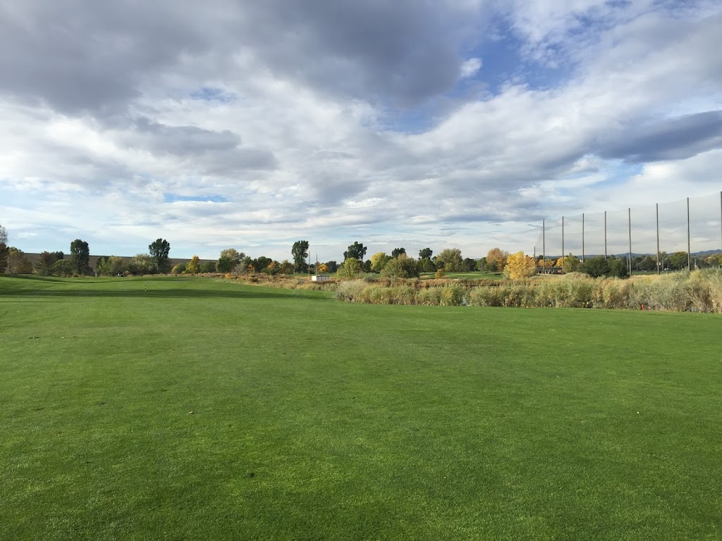 Panoramic view of a lush green golf course at Kennedy Golf Course. Smooth