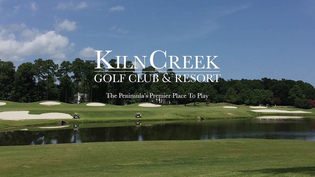 Panoramic view of a lush green golf course at Kiln Creek Golf Club and Resort. Smooth