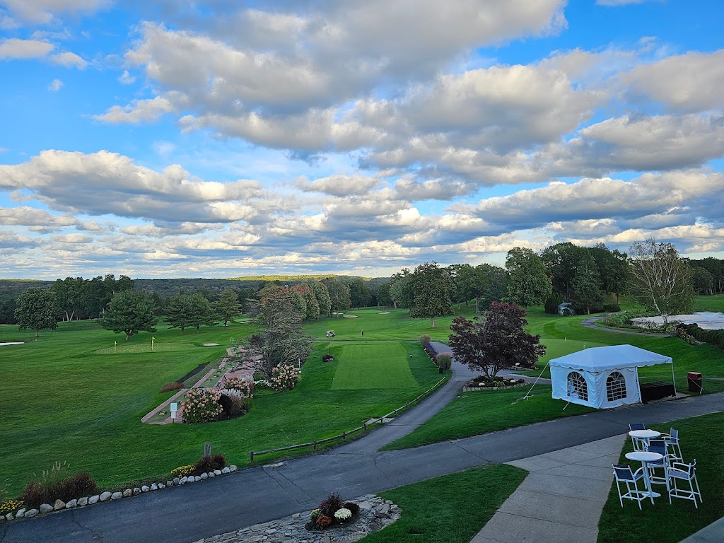 Panoramic view of a lush green golf course at Kirkbrae Country Club. Smooth