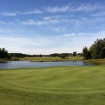 Panoramic view of a lush green golf course at Kiskiack Golf Club. Smooth