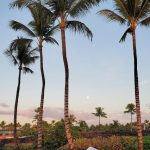 Panoramic view of a lush green golf course at Kukio Golf and Beach Club. Smooth