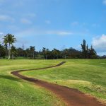 Panoramic view of a lush green golf course at Kukuiolono Park & Golf Course. Smooth