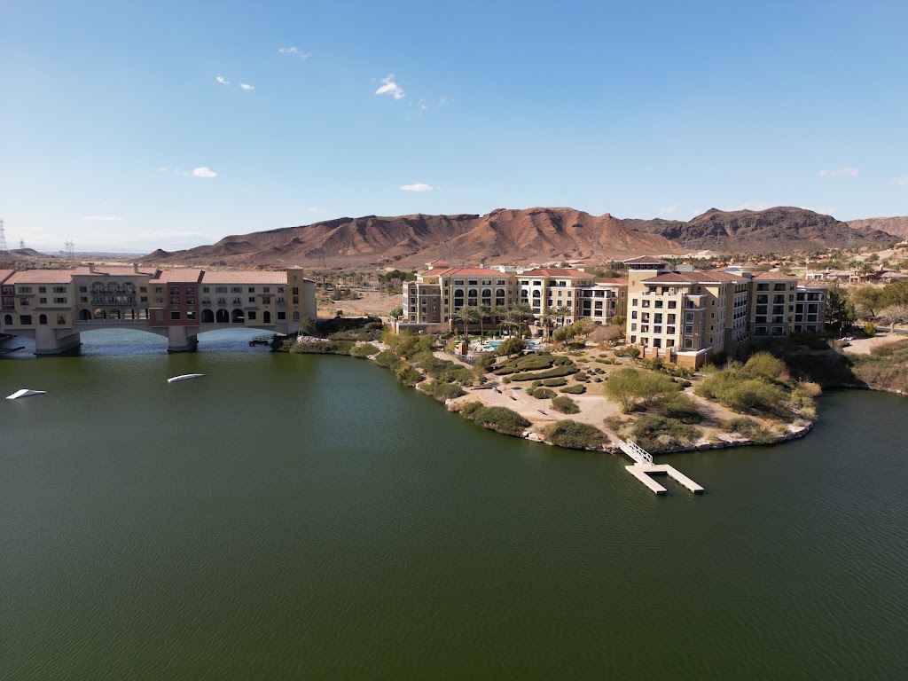 Panoramic view of a lush green golf course at Lake Las Vegas. Smooth