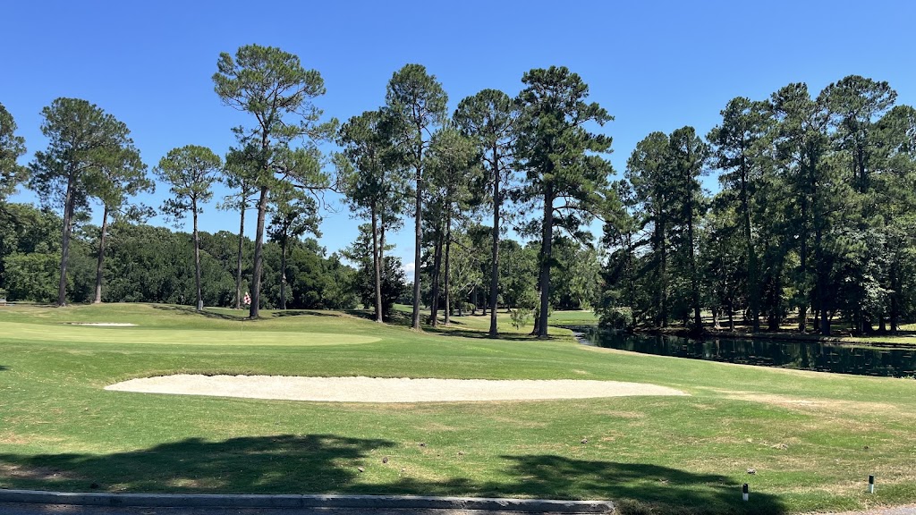 Panoramic view of a lush green golf course at Lake Marion Golf Course. Smooth