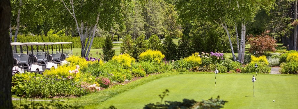 Panoramic view of a lush green golf course at Lake Morey Country Club. Smooth