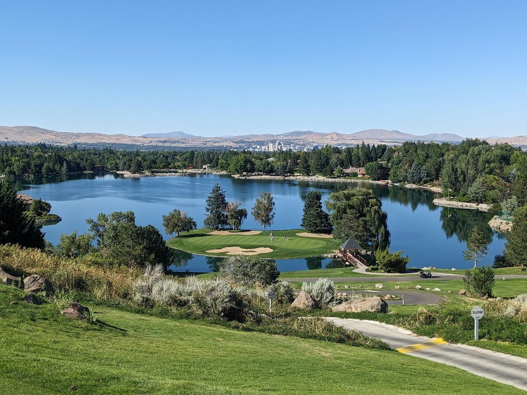 Panoramic view of a lush green golf course at Lakeridge Golf Course. Smooth