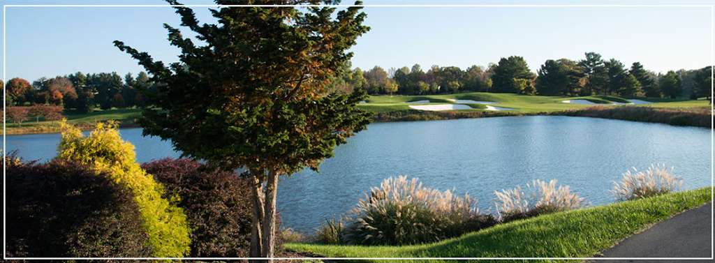 Panoramic view of a lush green golf course at Lakewood Country Club. Smooth