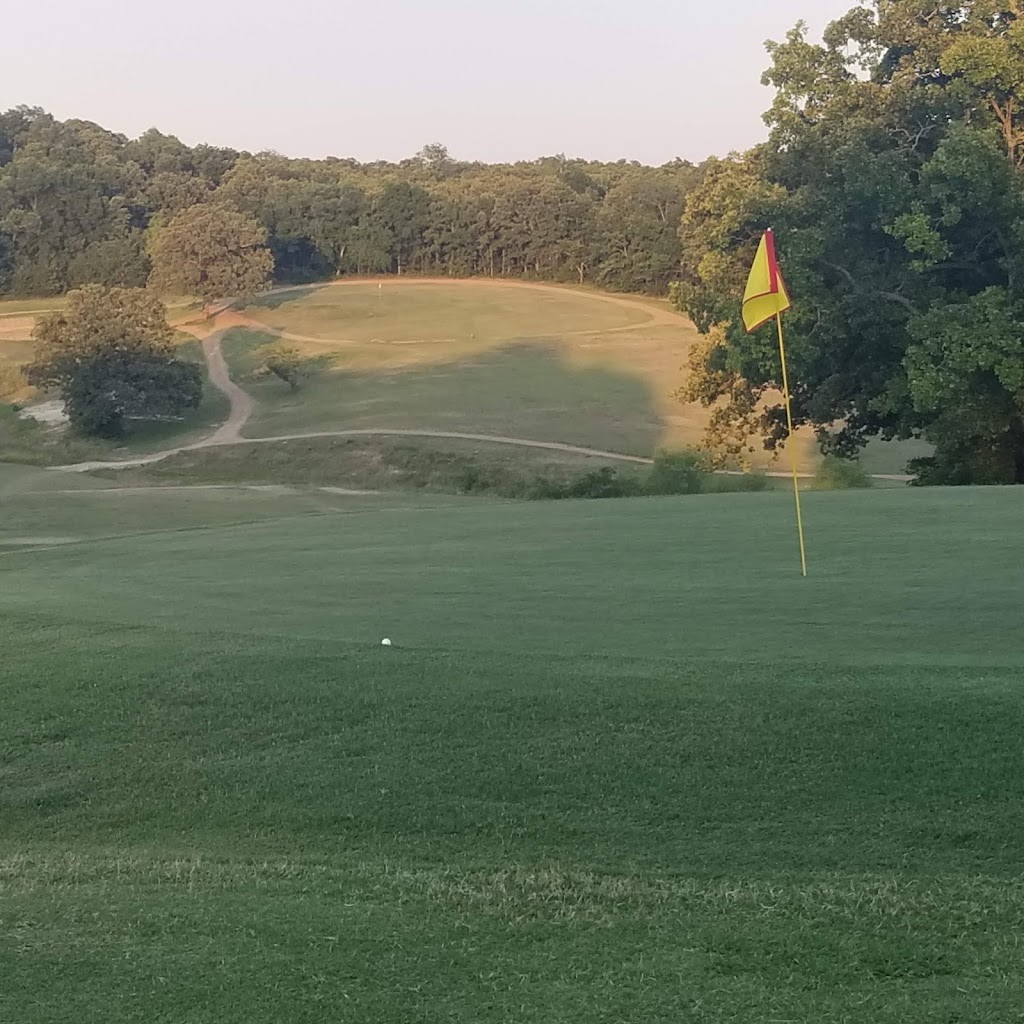 Panoramic view of a lush green golf course at Lakewood Golf Course. Smooth