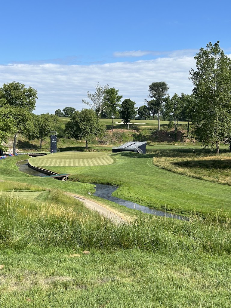 Panoramic view of a lush green golf course at Lancaster Country Club. Smooth