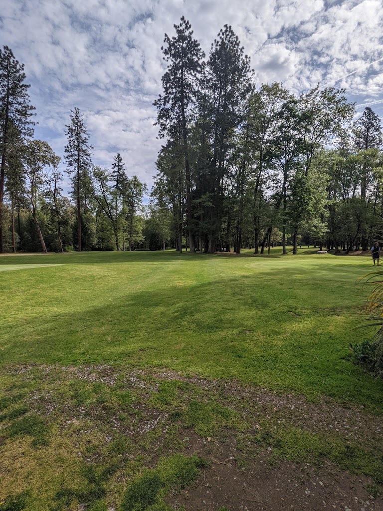 Panoramic view of a lush green golf course at Laurel Hill Golf Course. Smooth