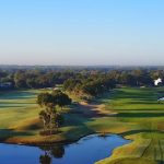 Panoramic view of a lush green golf course at Laurel Oak Country Club. Smooth