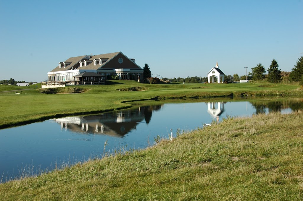 Panoramic view of a lush green golf course at Legacy By Arthur Hills Golf Club. Smooth