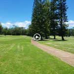 Panoramic view of a lush green golf course at Leilehua Golf Course. Smooth